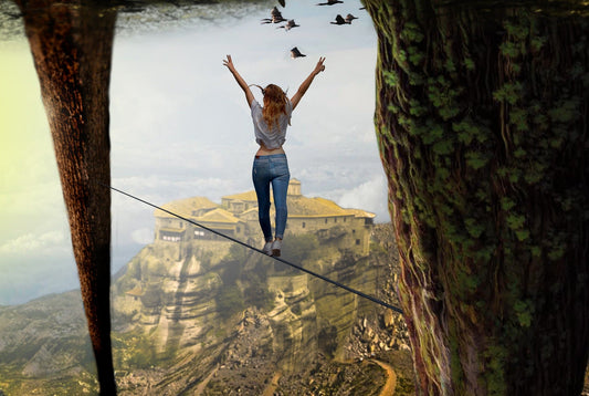 Women balanced on a rod in a beautiful panoramic background